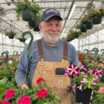 Mr. Cooper holding flower